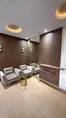 a waiting room with couches and a mirror at Villa Targa Marrakech in Marrakech