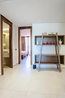a room with a bunk bed with a ladder at Palmier d'or - Marrakech Centre in Marrakech