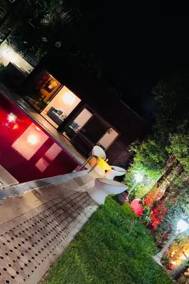 an aerial view of a house at night with a propellor at Villa Youri in Marrakech