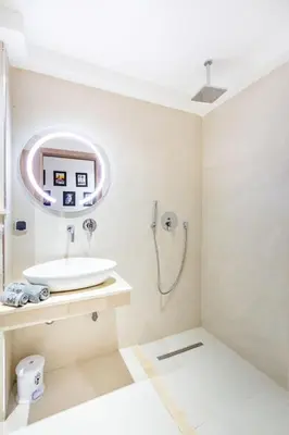 a bathroom with a sink and a shower at Appart 3 CH Menara Garden in Marrakech
