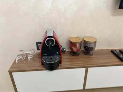 a red blender sitting on top of a counter at Appartement à Marrakech confortable et équipe in Marrakech