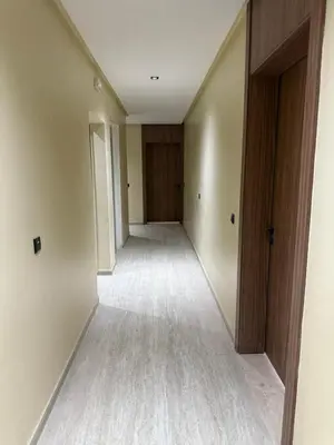 an empty hallway of an empty room with a door at Beautiful modern apartment 1 bedroom 2 people Menara Garden 2 in Marrakech