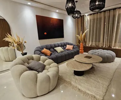 a living room with a couch and a table at Luxurious New Designer Apartment in Marrakech in Marrakech