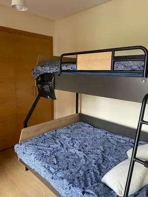 two bunk beds in a room with a mattress at appartement à prestigia golf marrakech- SAPHIR in Marrakech