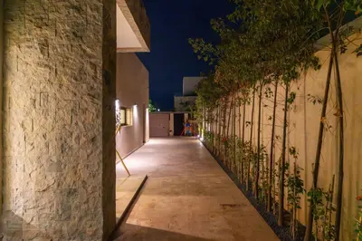 a hallway with a wall with plants on it at Villa Wimiliim - Piscine et jardin Privée Sans vis-à-vis Wifi HD in Segraga