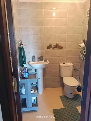 a bathroom with a toilet and a sink at Chicafrik in Marrakech