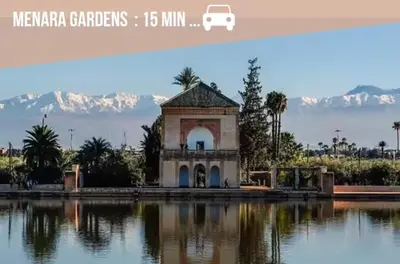 a small building in the middle of a lake at Résidence palmeraie gates Marrakech in Marrakech