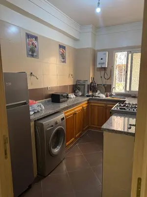 a kitchen with a washer and a washing machine at 2BR w Balcony in Gueliz 2 Bedroom Apartment with Balcony in Gueliz in Marrakech