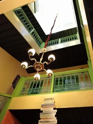 a chandelier hanging from the ceiling of a building at Riad Yousra in Marrakech