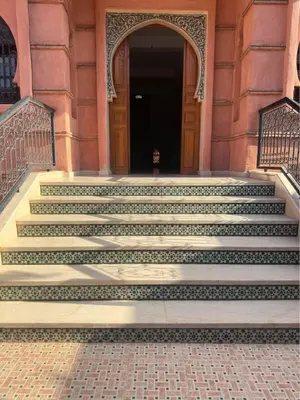 a set of stairs in front of a building at Villa Route de Casa in Marrakech