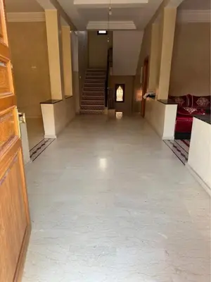 an empty hallway with stairs in a building at Villa Route de Casa in Marrakech