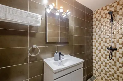a bathroom with a sink and a mirror at 5-min away to Marrakech Airport in Marrakech