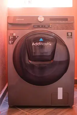 a washing machine with a clock on the front of it at 5-min away to Marrakech Airport in Marrakech
