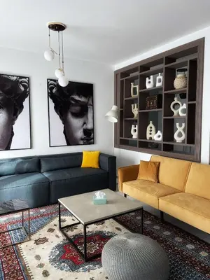 a living room with a couch and a table at Villa Corail in Marrakech