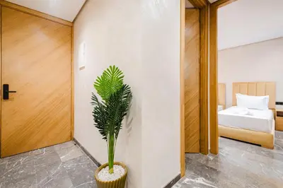 a plant in a room with a bedroom at New 2BR AC 5min from City Center-4 to 5Guests in Marrakech