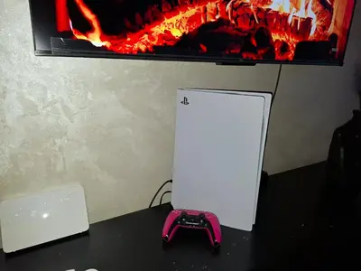 a computer monitor sitting on a table in front of a fireplace at Burj malak in Marrakech