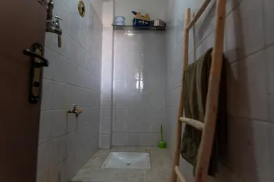 a bathroom with a shower with a toilet in it at Cozy studio with private terrace in Marrakech