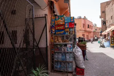 a food stand on the side of a street at Authentic Moroccan Stay Steps from Jemaa el-Fna in Marrakech