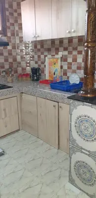 a kitchen with a counter top in a kitchen at Chez Omar in Marrakech