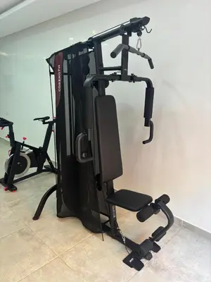 a gym with several exercise equipment in a room at Magnifique villa spacieuse Route de l'ourika in El Rhechat