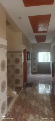an empty room with a room with a ceiling at Jolie petite villa in Marrakech