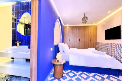 a hotel room with a bed and a sink at Luxury Apartment Retreat in Marrakech in Marrakech