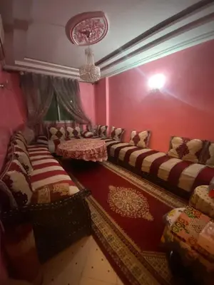 a room with a bunch of couches in a room at Marrakech house Your Haven of Peace in Marrakech in Marrakech