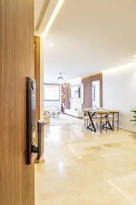 an open door to a living room with a table at Luxury 1BR in gueliz in Marrakech