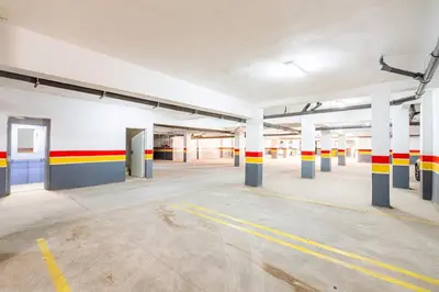 an empty parking lot in an empty parking garage at Pool views 2BR family apartment in Marrakech