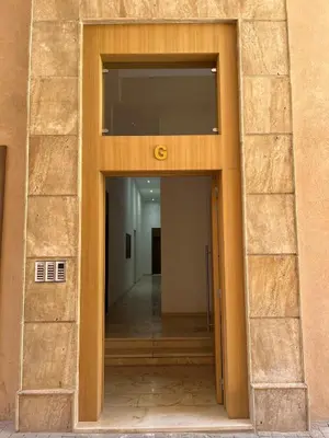 an open door to a hallway in a building at Appartement prestige gueliz in Marrakech