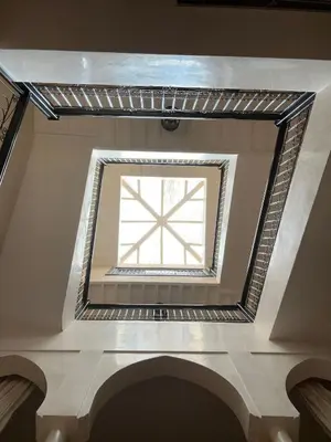 a window in the ceiling of a building at Dar Azélia - Charming riad with terrace & pool near Medina in Marrakech