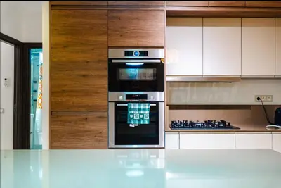 a kitchen with an oven and a stove at Gueliz BEST Residence Nour!! 3 Bedrooms Large Modern Apartment, walking distance to train station and everything in Marrakech