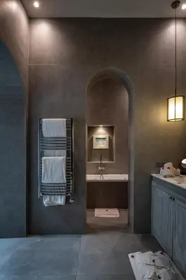 a bathroom with a sink and a mirror at Dar Mo'Da in Marrakech