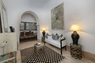a living room with a couch and a table at Dar Mo'Da in Marrakech