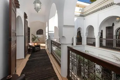 a hallway of a house with a balcony at Dar Mo'Da in Marrakech