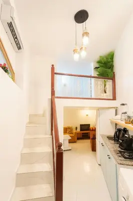 a staircase in a kitchen with a house at Studio mezzanine cosy près de Jemaa el-Fna in Marrakech