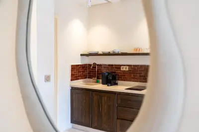 a kitchen with a sink and a counter top at Excellent apartment plus hot tub in Marrakech