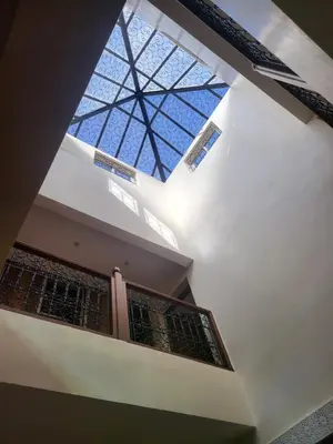 a skylight in the ceiling of a building at Riad Duplex de charme 2 chambres in Marrakech