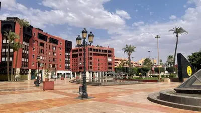 a city square with buildings and a street light at Chic Plaza City Center in Marrakech
