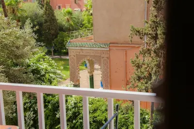 a view of a building from a balcony at Stylish YSL Street 2-BDR, parking, hi speed wifi in Marrakech