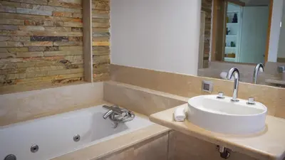 a bathroom with a sink and a bath tub at Luxury Villa 4 Bedrooms with Big Pool 5km from Medina in Marrakech