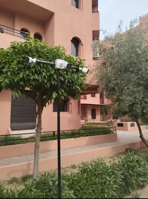 a street light in front of a building at Marrakech Luxury Apartment with Pool & gym in Marrakech