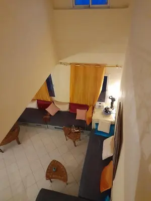 a view of a room with a table and chairs at Marrakech en toute simplicité in Marrakech