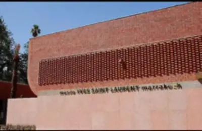 a building with a sign on the side of it at Blue Majorelle in Marrakech