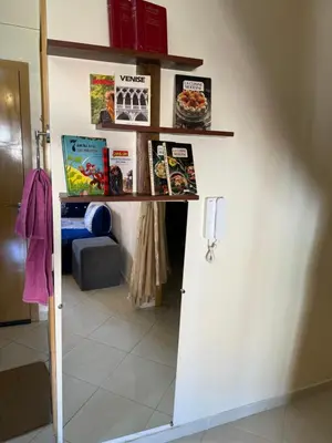 a room with a shelf on the wall at Apparemment à Marrakech in Marrakech