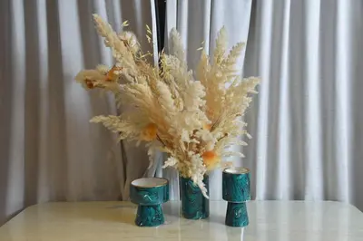 two green vases with a plant in them on a table at Suite Ultra Deluxe, Babylone, Ultra Confort, Hyper-Centre, Marrakesh in Marrakech