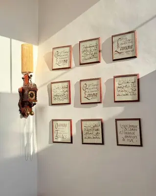 a wall with a bunch of framed signatures at Dar Skouri in Marrakech