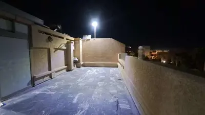 a street light on top of a building at night at Villa Zohra in Marrakech