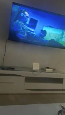 a flat screen tv sitting on top of a table at Said in Marrakech