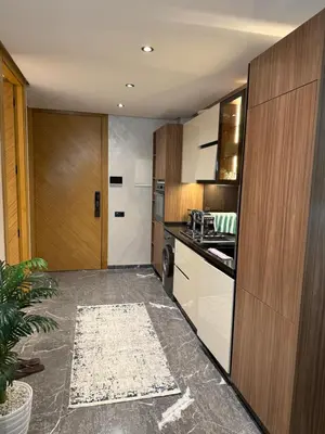a kitchen with a sink and a stove at Elite studio 17 in Marrakech